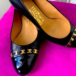 Salvatore Ferragamo Black and Gold Pumps